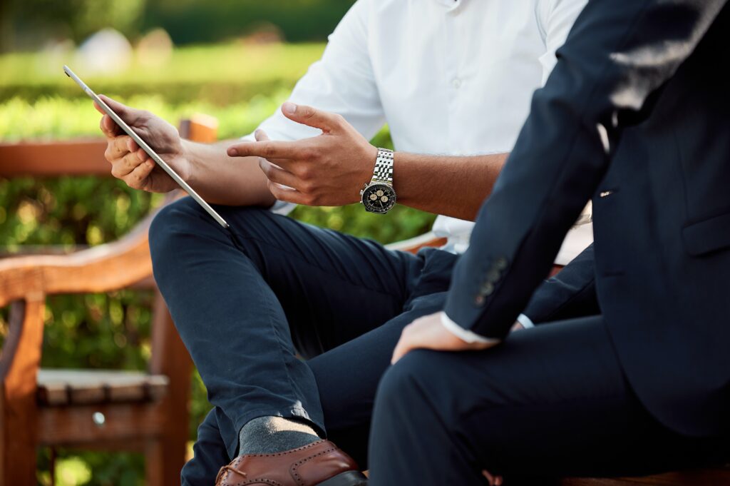 Financial advisor reviewing wealth goals with high-net-worth client.